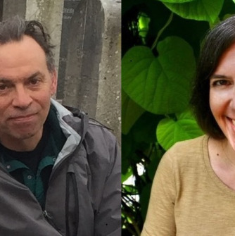 On left man in gray jacket and on right woman in beige sweater