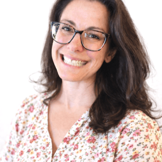 Principal Jessica Patti Smiling Wearing Glasses