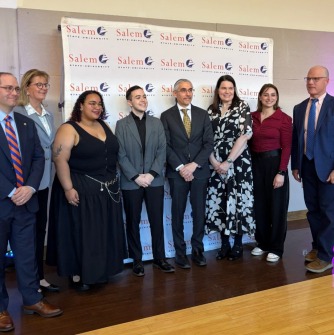 From left to right: Mayor Pangallo, Senator Lovely, Kiana Alexis, Aiden DeCaro, Dr. Marcos Luna, Elizabeth McKeigue, Venere Salzillo, and President John Keenan.