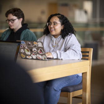 Student with Computer