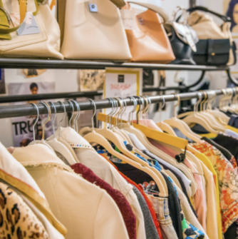 Clothes hang on a rack