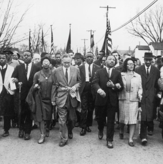 Martin Luther King, Jr. and other civil rights leaders marching together