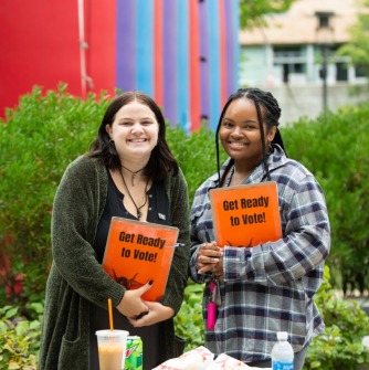 Ambassadors for Voterpalooza get ready to register students to vote ahead of a prior election.