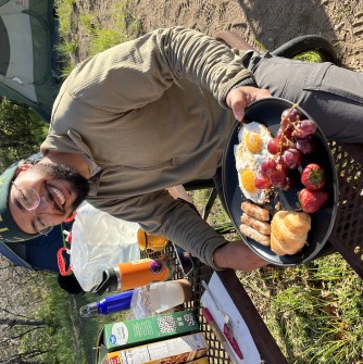 Danny with his camp breakfast – we ate well