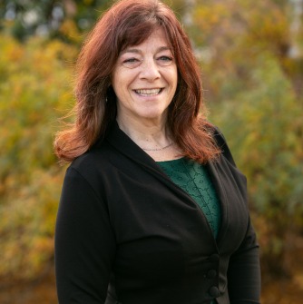 Headshot image of Professor Monica Leisey