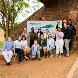 Dr. Dan Eshet and students from Salem State University at the entrance of Akagera National Park in the summer of 2022