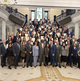 MA Black and Latino Legislative Caucus Latino Excellence Awards ceremony at State House (Luna is at top of stairs)