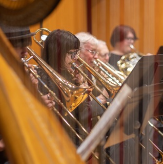 musicians playing trombone and harp