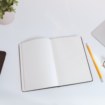 glasses and notebook image