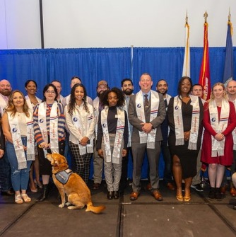 The class of 2024 Veterans receive their stoles during a ceremony thanking them for their service.