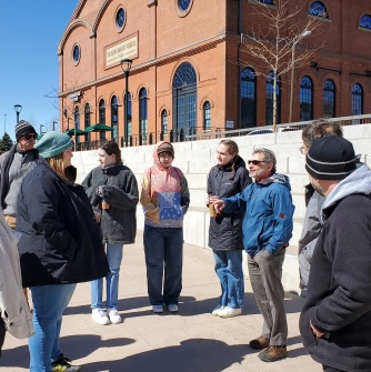 Professor Keith Ratner leads a tour of Denver with Geography and Sustainability students and faculty