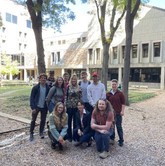 Professor Doll and U CO Boulder students and faculty