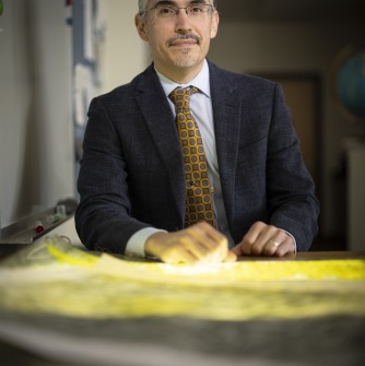Headshot of Professor Marcos Luna