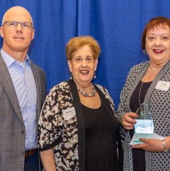 Pictured above: President John D. Keenan; Andrea C. Liftman '75G, Salem State University Alumni Association and Foundation; and Carla Guarnieri ’75