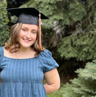 Marguerite Ortiz '22 in her graduation cap