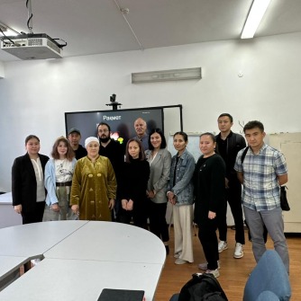 Professor Young with faculty from the Geography and Land Management Department