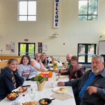 Families gathered around the table at brunch