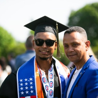 Graduate and family members pose together after ceremony