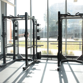 Using pull-up bars and cardio and turf area to do push-ups.