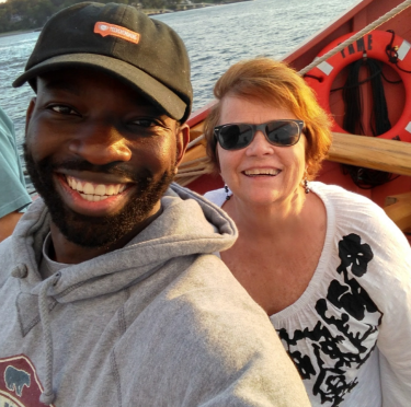 Mary Dunn pictured with alumnus Jovan Sempa on a Salem State outing.