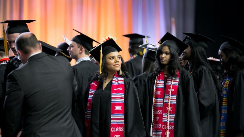 Female student looking at the audience during Commencement