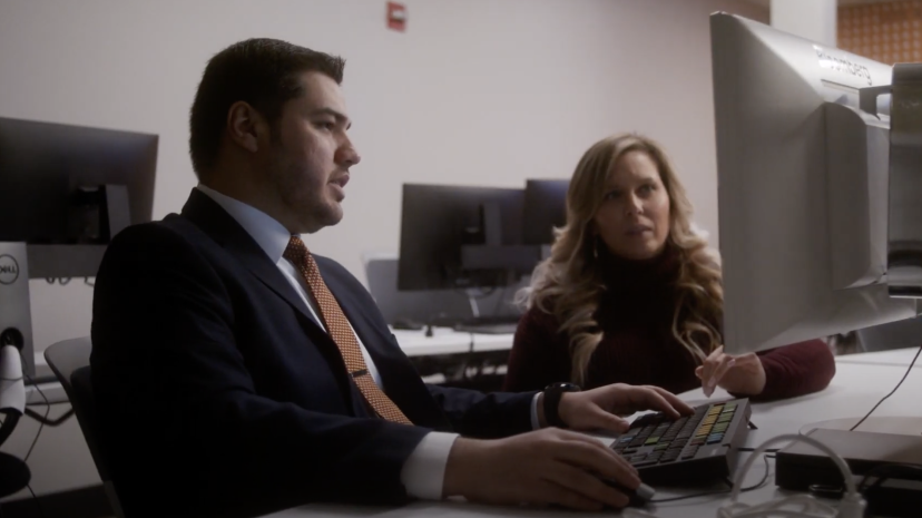 A male student and a female student in the Bloomberg lab.