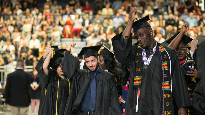 Students moving their tassels at Commencement
