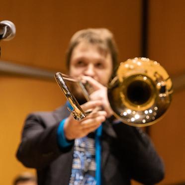 A student performing the trumpet at the Recital Hall